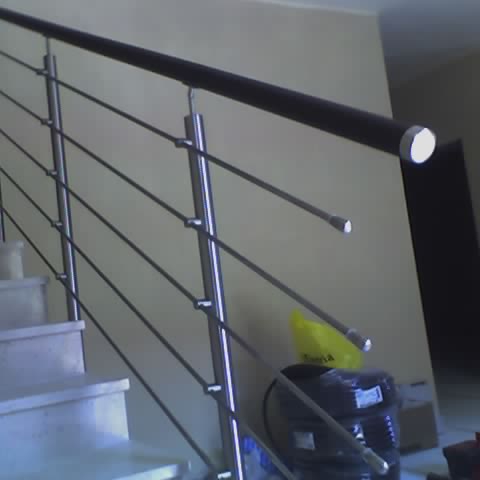 Ringhiera in acciaio inox con corrimano in legno